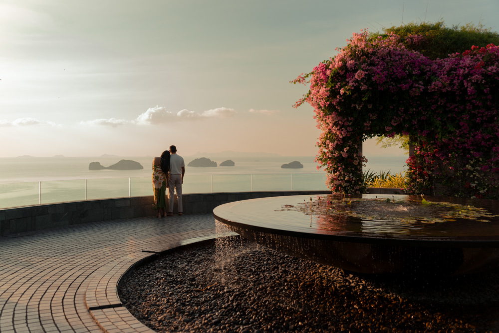 Couple at a seaside overlook at golden hour, Koh Samui