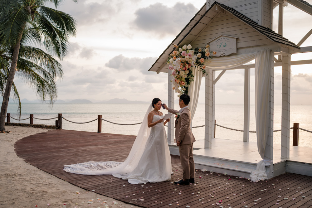 Bride and groom during a seaside chapel ceremony on Koh Samui