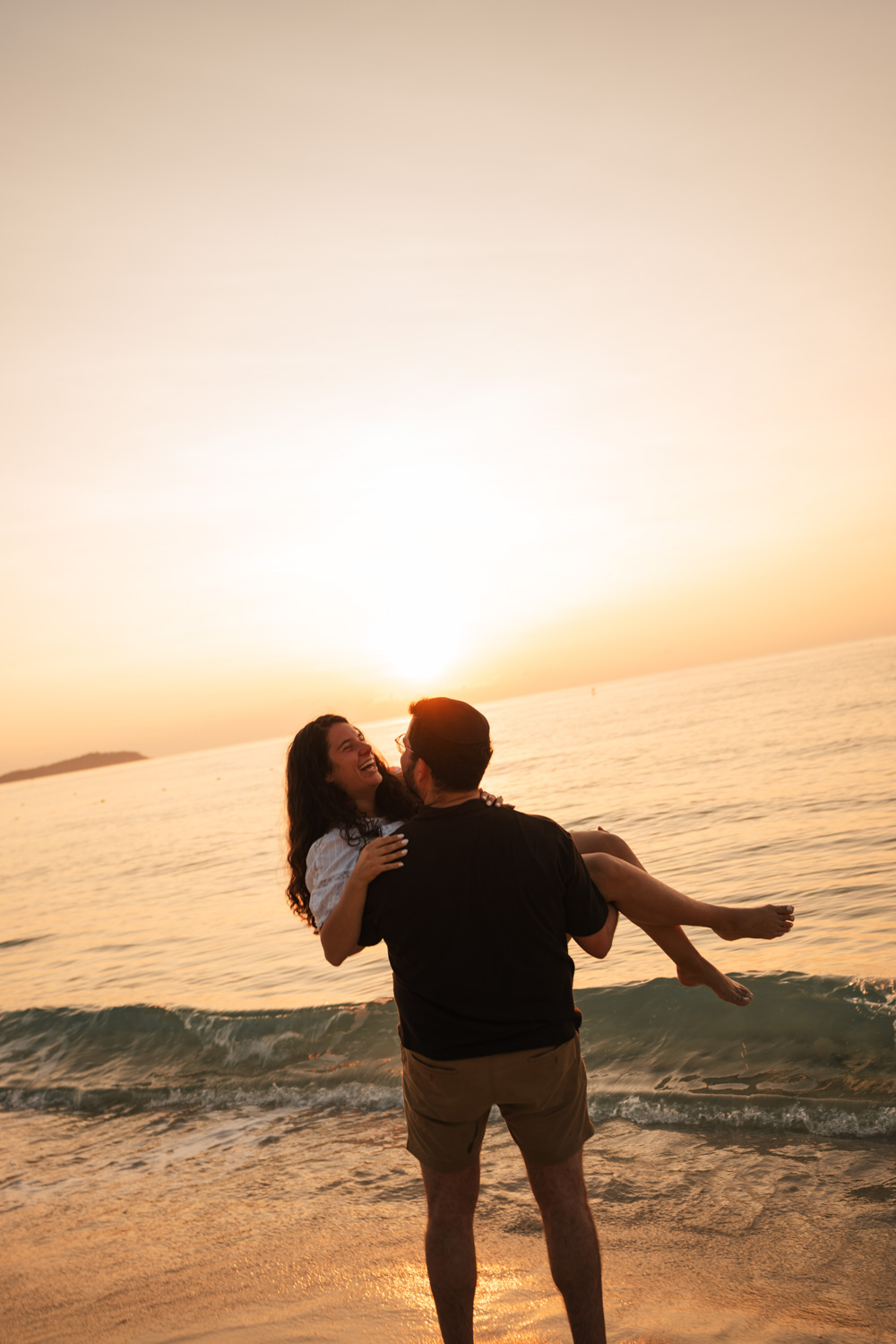Couple portrait photographed at golden hour on the Pattaya coast