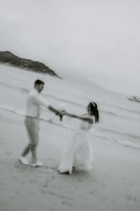 Couple dancing on the beach